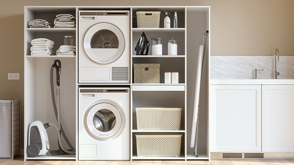 droogkast op wasmachine in een kast